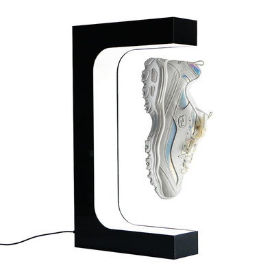 La moda que eleva y mantiene flotando el soporte de exhibición flotante magnético de los zapatos y la exhibición de la tienda para la suposición de los zapatos separan la unidad de visualización de los zapatos blanca